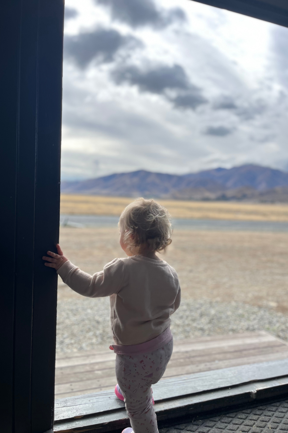 how to find yourself after motherhood  picture of a child in front of the mountains