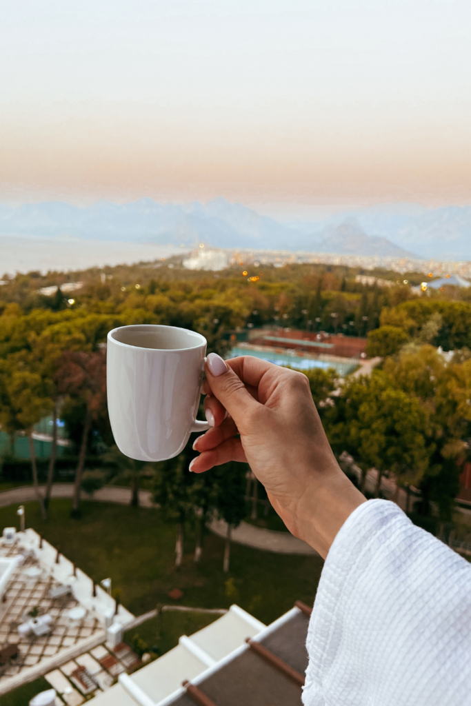 how to find yourself after motherhood self care coffee and a view image